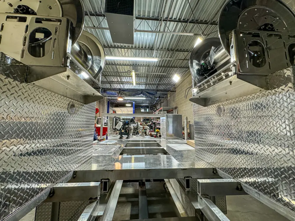 Apparatus in production bay with hood open, photo 161 of 303.